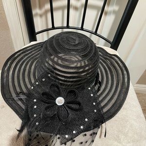 Black women’s hat sheer Kentucky Derby flowers